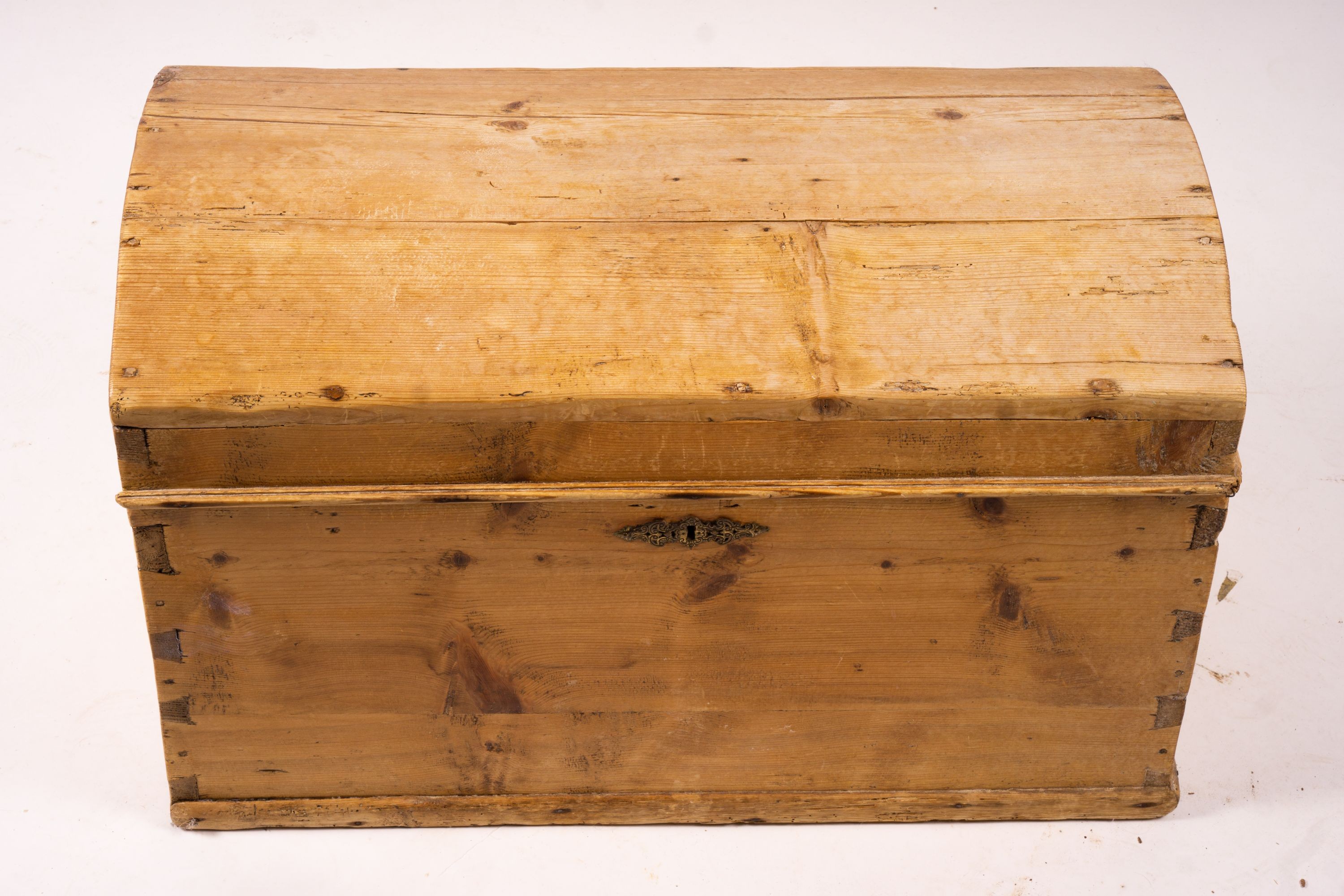 A small 19th century Continental pine domed top trunk, length 74cm, width 40cm, height 46cm